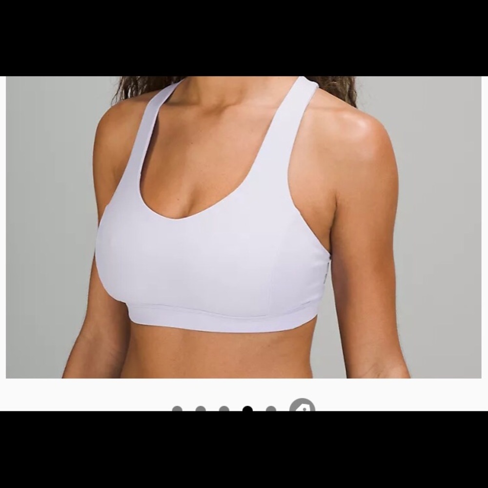 NWT Lululemon sports bra. Coverage for C/D cup up front and a strappy open back.